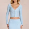 Odelia kanten cardigan met diepe halslijn  in poederblauw
