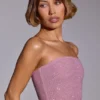 Odetta versierde strapless crop top in lichtroze
