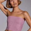 Odetta versierde strapless crop top in lichtroze