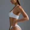 Oh Polly Badmode: HOTFIX Edition versierde bandeau-bikinitop met één schouder in wit