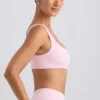 One-shoulder sportbeha in gewassen ijspink
