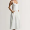 Orlena halterjurk met knoopdetails in wit
