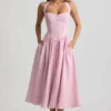 Orlena halterjurk met knoopdetails in zachtroze