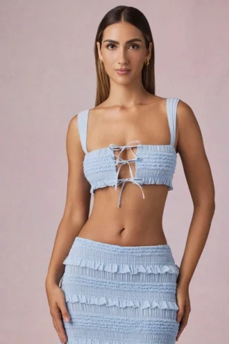 Ottilie crop top met ruches en strik aan de voorkant in poederblauw