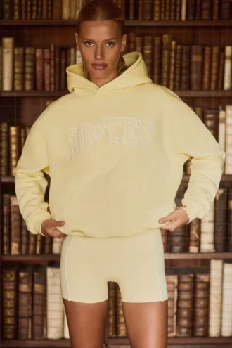 Oversized hoodie met borduursel in zachtgeel
