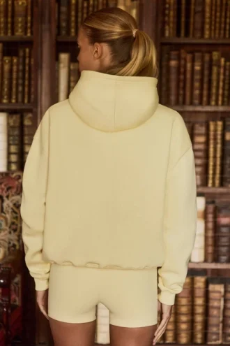 Oversized hoodie met borduursel in zachtgeel