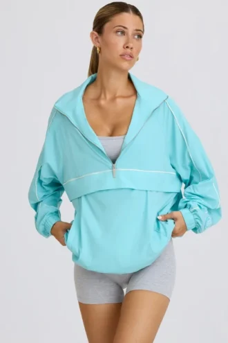 Oversized trainingsjack in aqua