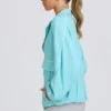Oversized trainingsjack in aqua