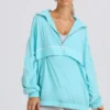 Oversized trainingsjack in aqua