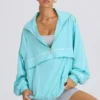 Oversized trainingsjack in aqua