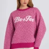Oversized trui met gebreid logo in magenta roze