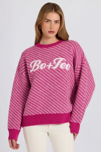 Oversized trui met gebreid logo in magenta roze