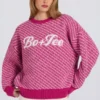Oversized trui met gebreid logo in magenta roze