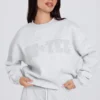 Oversized trui met ronde hals in grijs gemêleerd