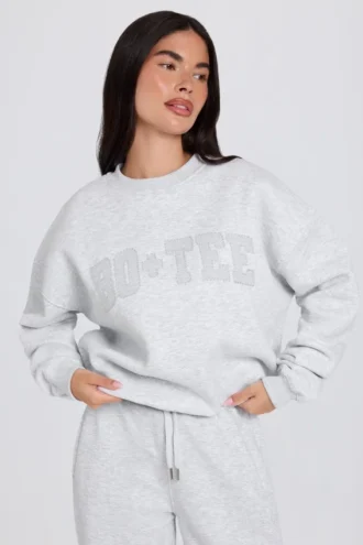 Oversized trui met ronde hals in grijs gemêleerd