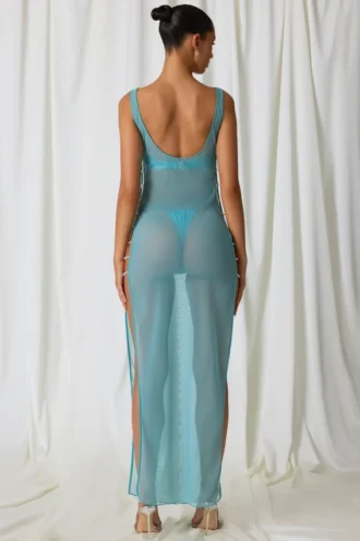 Pacifica maxijurk met parelversiering en uitsnijdingen in turquoise