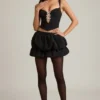 Pearla korset-top met uitsnijdingen en strikdetail in zwart