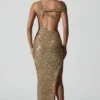 Persephone versierde asymmetrische jurk met uitsnijdingen in goud