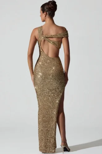 Persephone versierde asymmetrische jurk met uitsnijdingen in goud