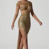 Persephone versierde asymmetrische jurk met uitsnijdingen in goud