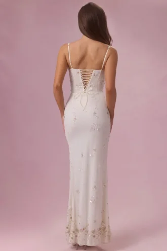 Primara versierde corset maxijurk in ivoor