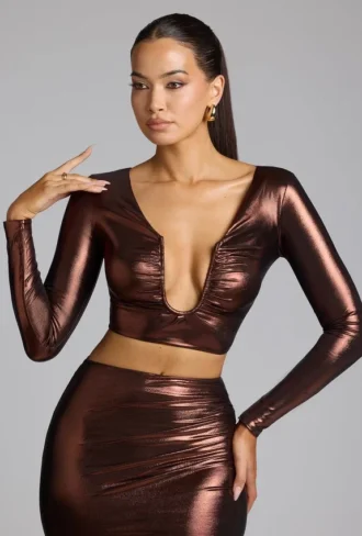 Rana crop top met diepe halslijn van metallic jersey in koperbrons