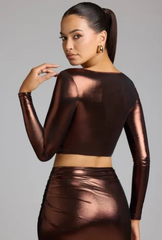 Rana crop top met diepe halslijn van metallic jersey in koperbrons