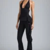 Reese metallic flared broek met ruches en lage taille in zwart