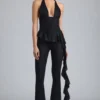 Reese metallic flared broek met ruches en lage taille in zwart