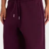 Relaxte joggingbroek van geborsteld katoenjersey met middelhoge taille in bordeauxrood