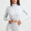Rugloze coltrui met lange mouwen en cropped lengte in grijs gemêleerd