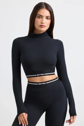 Rugloze crop top met col en lange mouwen in zwart