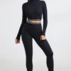 Rugloze crop top met col en lange mouwen in zwart