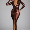 Safiya avondjurk met lange mouwen van metallic jersey in koperbrons