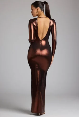 Safiya avondjurk met lange mouwen van metallic jersey in koperbrons