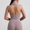 Sakari geribbelde coltrui met open rug in taupe