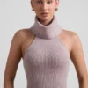 Sakari geribbelde coltrui met open rug in taupe