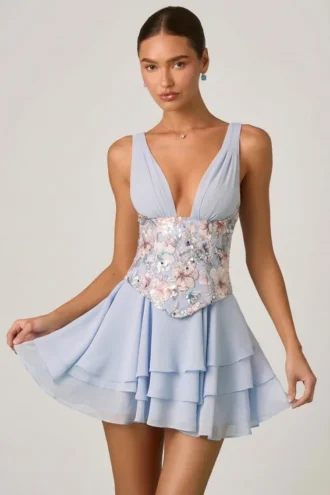 Sakura minijurk met versierde ruches en korset in bloemenblauw