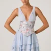 Sakura minijurk met versierde ruches en korset in bloemenblauw