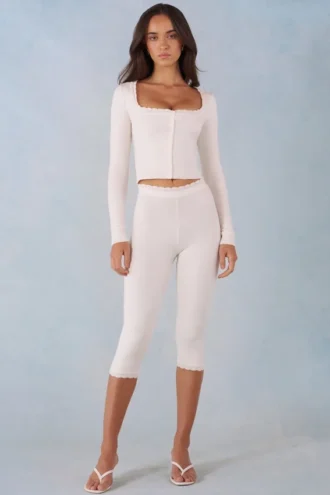 Selene gebreide capribroek met middelhoge taille in ivoor
