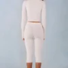 Selene gebreide capribroek met middelhoge taille in ivoor
