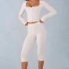 Selene gebreide capribroek met middelhoge taille in ivoor