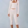 Selene gebreide capribroek met middelhoge taille in ivoor