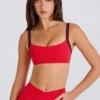 Soft Active sportbeha met contrasterende rand in aardbeirood