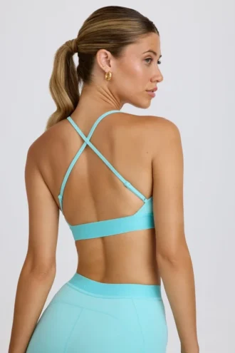 Soft Active sportbeha met gekruiste bandjes in aqua