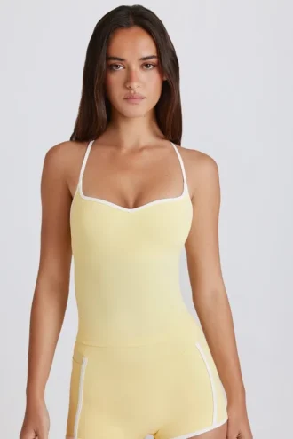 Soft Active tanktop met gekruiste bandjes in Lemon