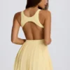 Soft Active tennisjurk met open rug en plooien in Lemon