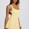 Soft Active tennisjurk met open rug en plooien in Lemon