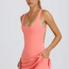 Soft Active tennisjurk met open rug in koraal