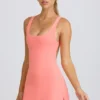 Soft Active tennisjurk met open rug in koraal